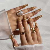 Champagne Gold Relic COME0024 press-on nails hand model scene view 1