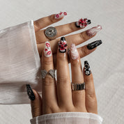 Cherry Kiss Noir COME0029 press-on nails hand model scene view 1