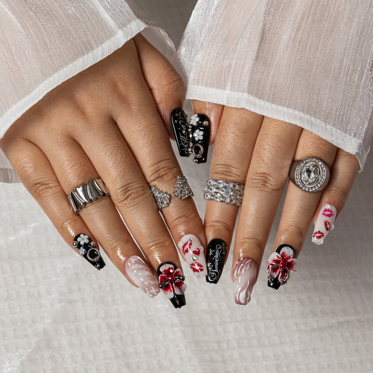 Cherry Kiss Noir COME0029 press-on nails hand model scene view 2