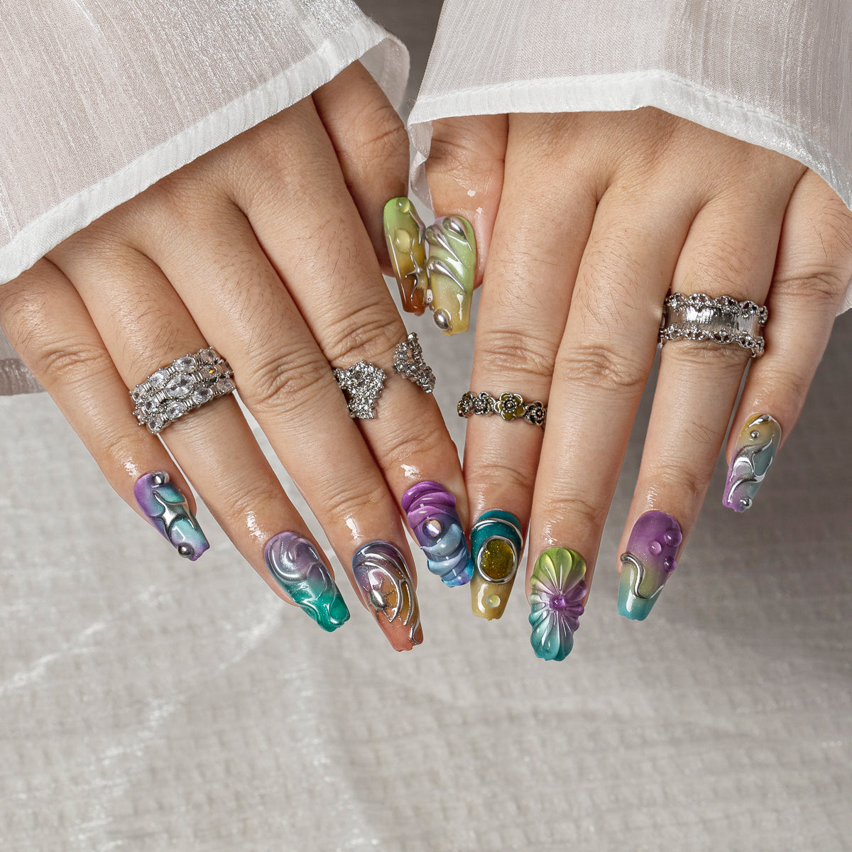 Prismatic Chrome Wave COME0034 press-on nails hand model scene view 1