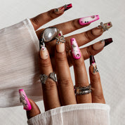 Pink Noir Butterfly COME0035 press-on nails hand model scene view 1