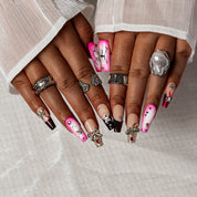 Pink Noir Butterfly COME0035 press-on nails hand model scene view 2