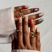 Pastel Safari Mosaic COSH0011 press-on nails hand model scene view 1