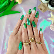 green flower nails medium almond press-on nails with metallic luster and botanical green design