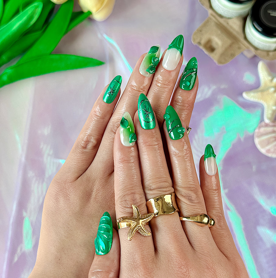 green flower nails medium almond press-on nails with metallic luster and botanical green design