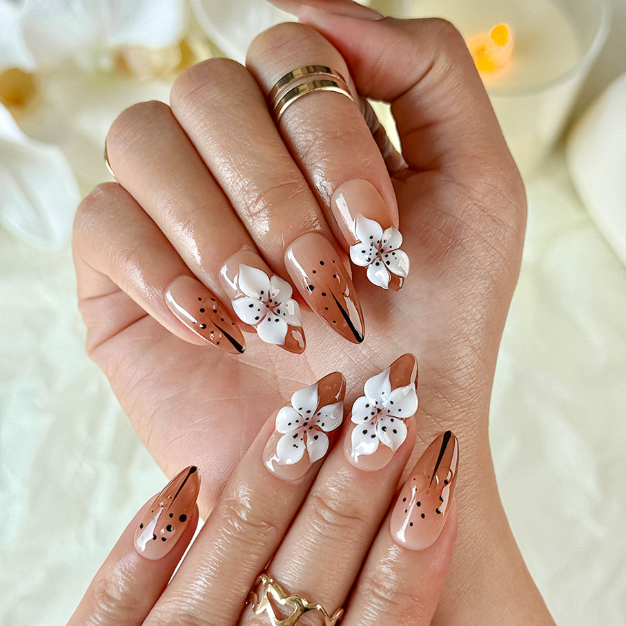 light brown nail medium almond press-on nails with white flower detail for holiday prom fall winter