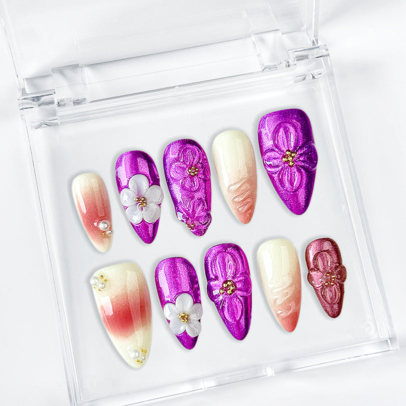 nail designs purple and pink medium almond press-on nails with metallic luster and flower details