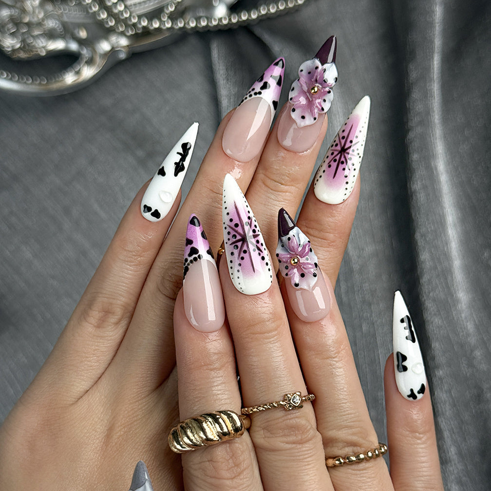 nail designs zebra long stiletto press-on nails with purple and white french tips zebra-inspired accents and flower details for holiday summer winter style