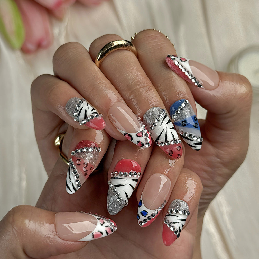 nail designs zebra medium almond press-on nails with pink and white french tips zebra accents and rhinestone sparkle luxury prom summer style