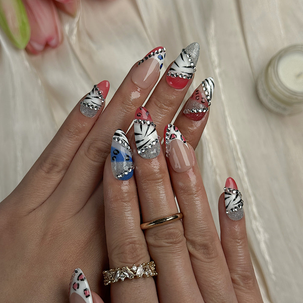 nail designs zebra medium almond press-on nails with pink and white french tips zebra accents and rhinestone sparkle luxury prom summer style