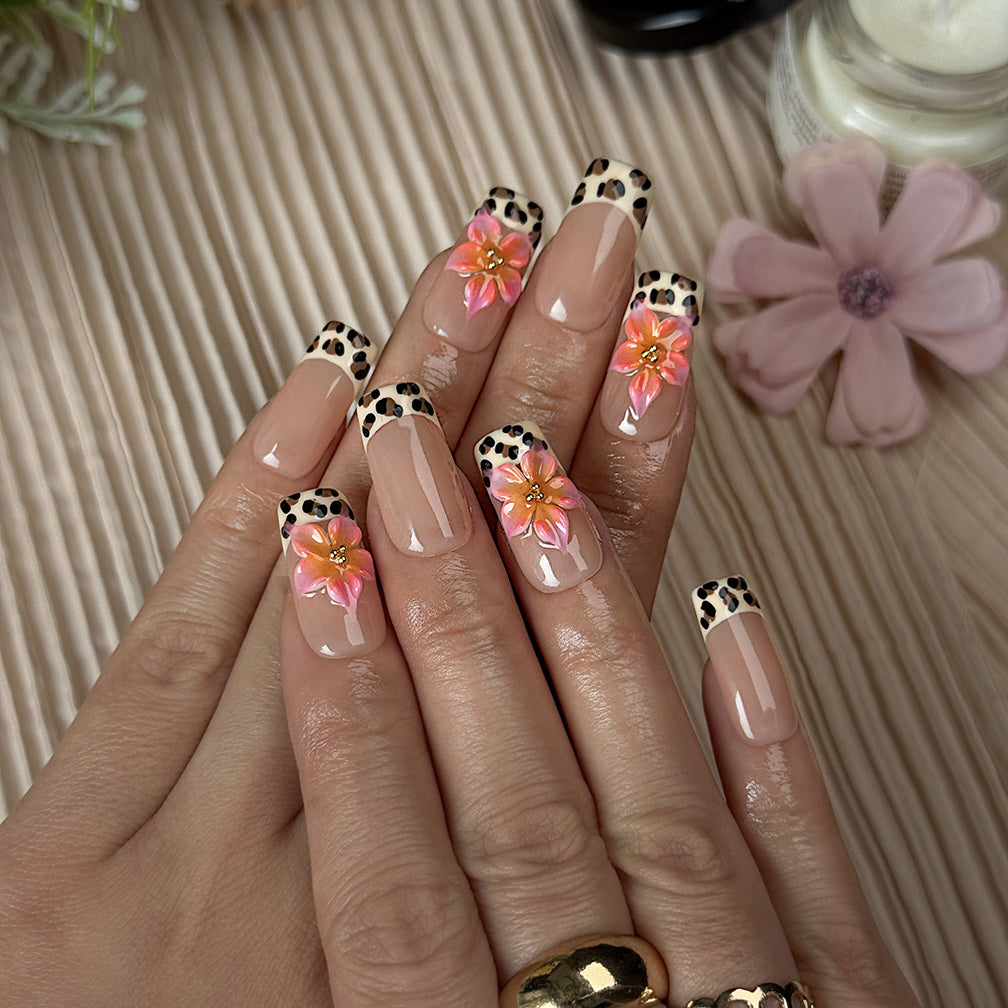 nail designs zebra medium square press-on nails with nude base brown spotted french tips and flower accents simple nail art spring prom style
