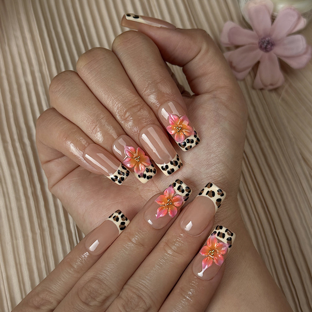 nail designs zebra medium square press-on nails with nude base brown spotted french tips and flower accents simple nail art spring prom style
