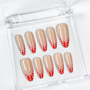 nail designs zebra inspired nude long almond press-on nails with red french tips and white polka dots for summer and prom
