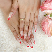 nail designs zebra inspired nude long almond press-on nails with red french tips and white polka dots for summer and prom