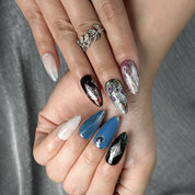 nails blue silver medium almond press-on nails with metallic luster in blue silver and red accents cool winter holiday style