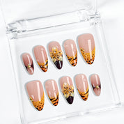 nails orange pink medium almond nude press-on nails with orange French tips and flower detail for summer beach party