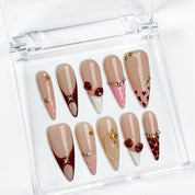 nude french tip nails long stiletto press-on nails with nude base brown tips and subtle gem accents prom fall winter style