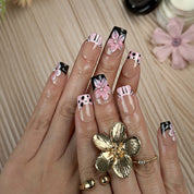 nude nails with flowers short square press-on nails with nude base pink and black french tips cute flower accents spring beach party style