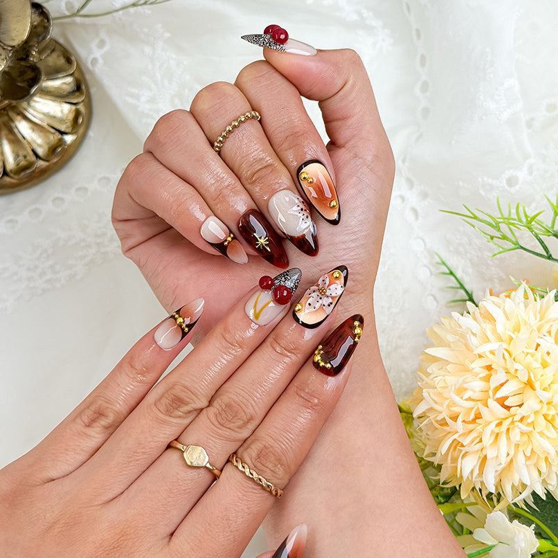 orange and brown nails medium almond luxury flower press-on nails with red and gold fall details