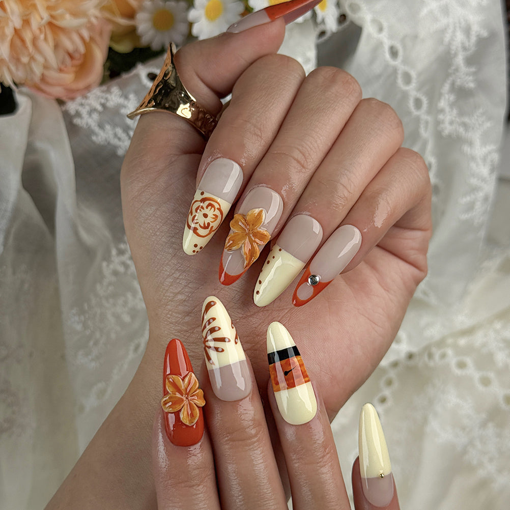 orange red nail colors long almond press-on nails with floral accents beach spring tropical style