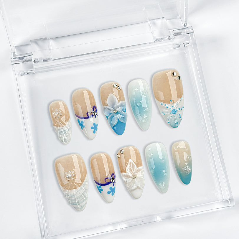 pale blue nail medium almond nude white press-on nails with flower accents and French tip design