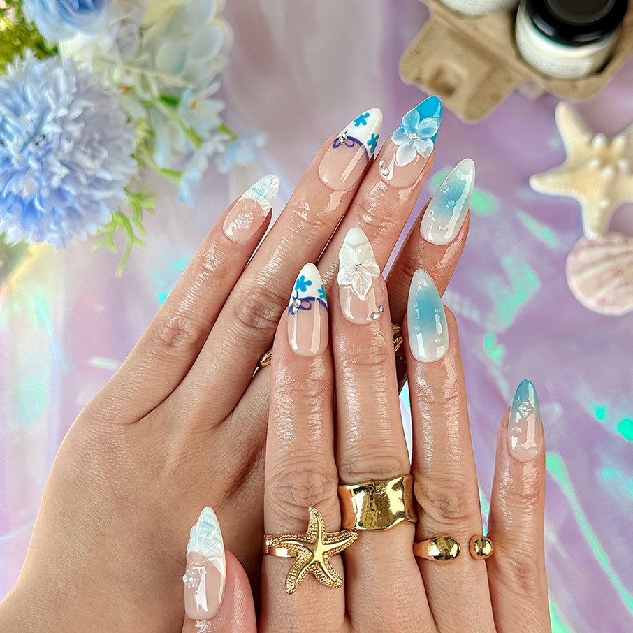 pale blue nail medium almond nude white press-on nails with flower accents and French tip design