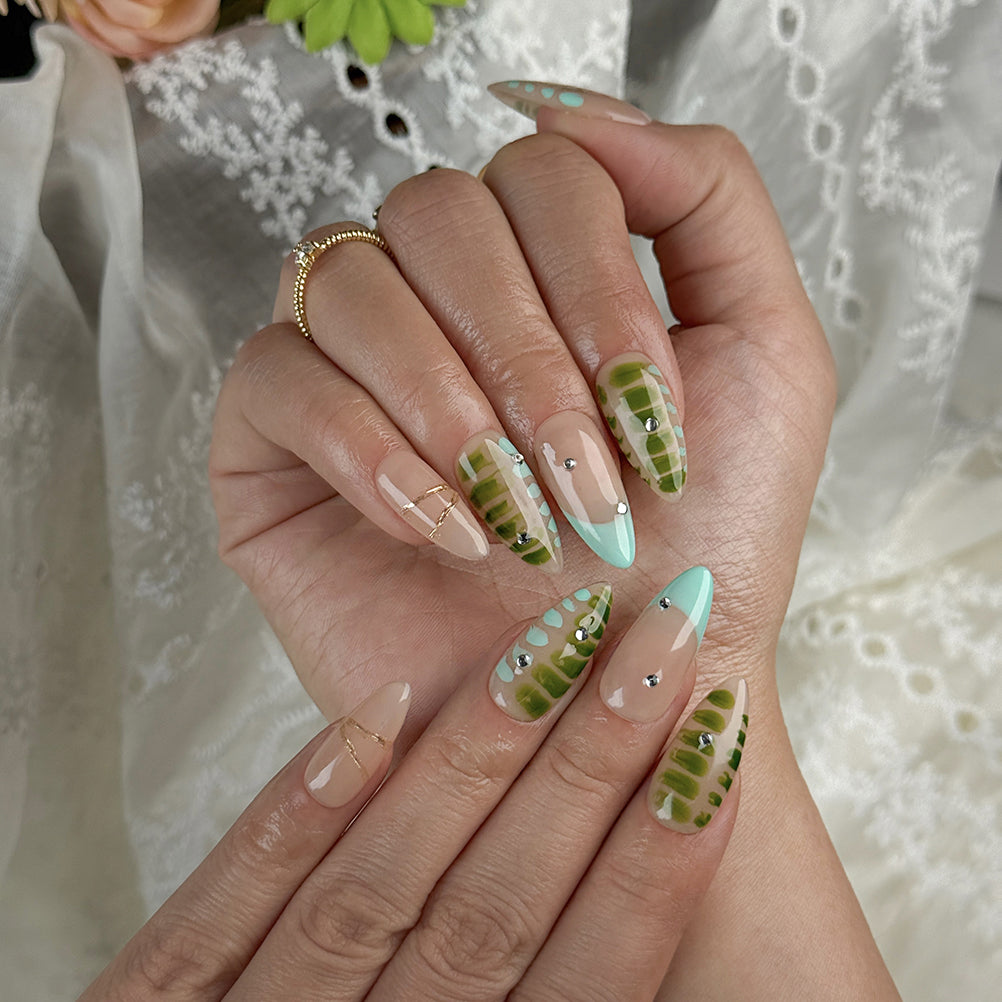 pastel green nails medium almond press-on nails with nude base mint accents color-block design spring holiday style