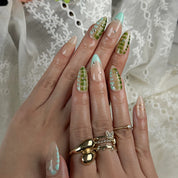 pastel green nails medium almond press-on nails with nude base mint accents color-block design spring holiday style