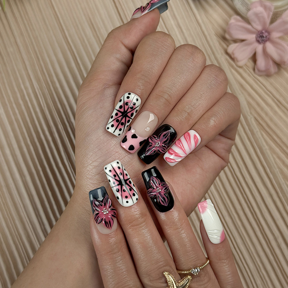 pink black nail designs medium square press-on nails in pink and white with black accents bold flower art luxury spring beach party style