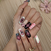 pink black nail designs medium square press-on nails in pink and white with black accents bold flower art luxury spring beach party style
