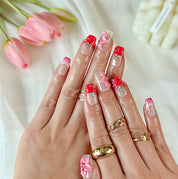 pink floral nails short square nude press-on nails with red French tips and cute flower details