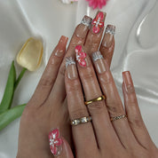 pink nude nail medium square press-on nails with nude brown base pink flower accents and pearl details for prom spring beach party style