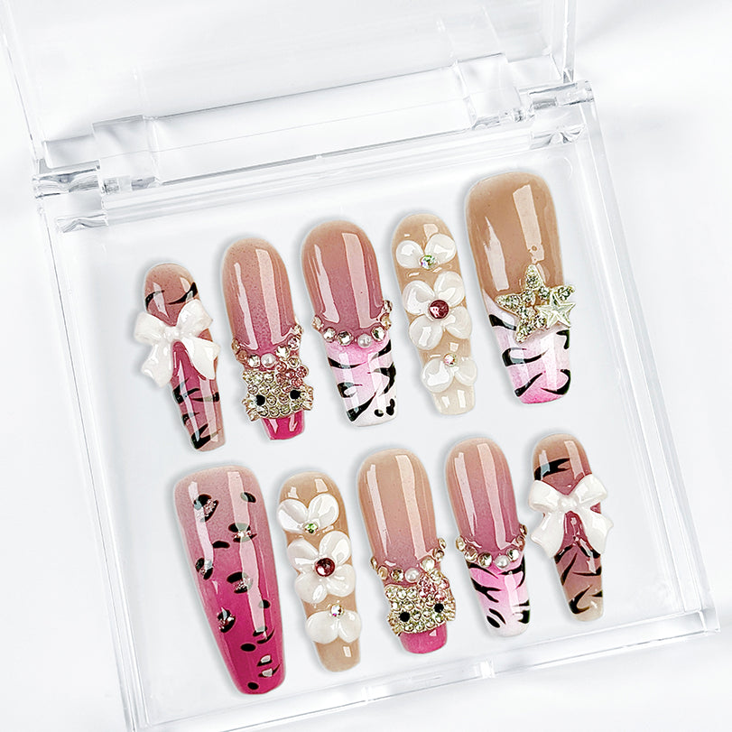 pink ombre nails with rhinestones long square nude pink press-on nails with floral and bow details