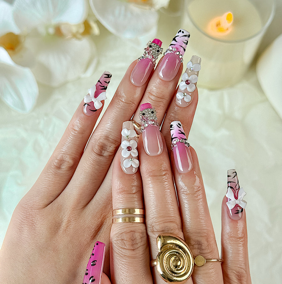 pink ombre nails with rhinestones long square nude pink press-on nails with floral and bow details