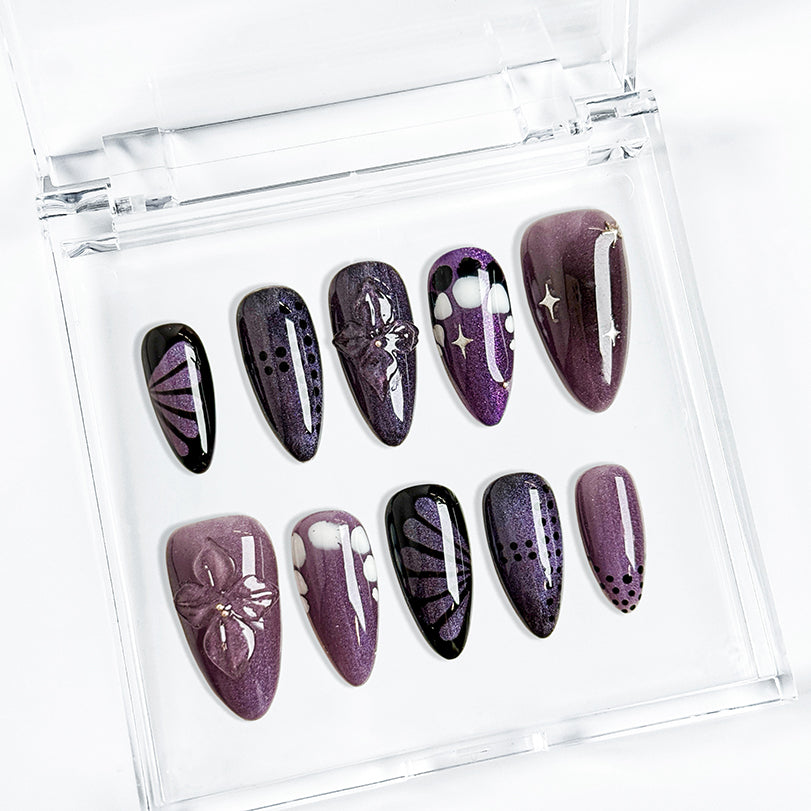 purple flower nails medium almond press-on nails in black and deep purple with subtle floral accents cool winter holiday style