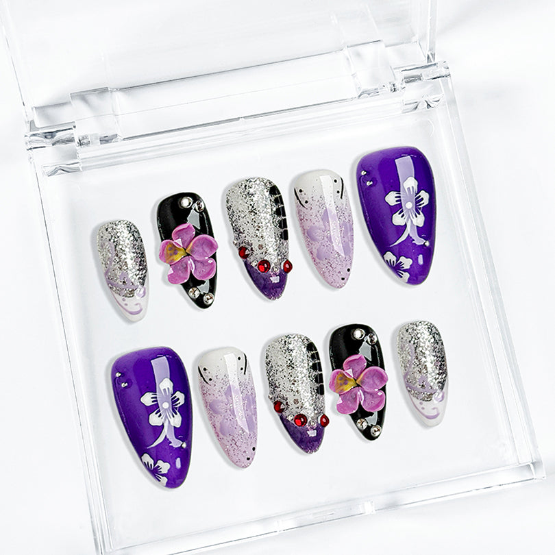 purple flower nails medium almond press-on nails with purple and white tones glitter sparkle and flower accents luxury summer holiday style