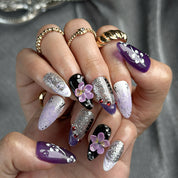 purple flower nails medium almond press-on nails with purple and white tones glitter sparkle and flower accents luxury summer holiday style