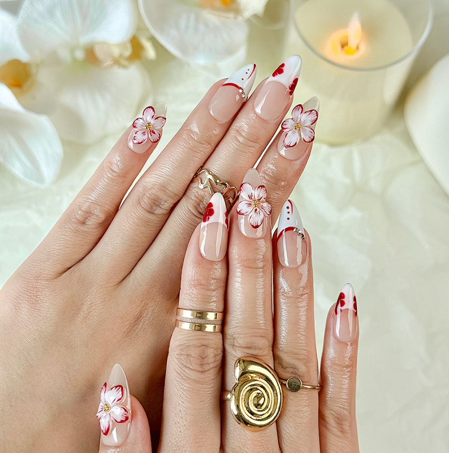 red flower nails medium almond nude white press-on nails with floral accents and French tip design