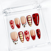 red flower nails medium almond press-on nails with nude base red tips yellow accents floral details and french tip design prom summer style