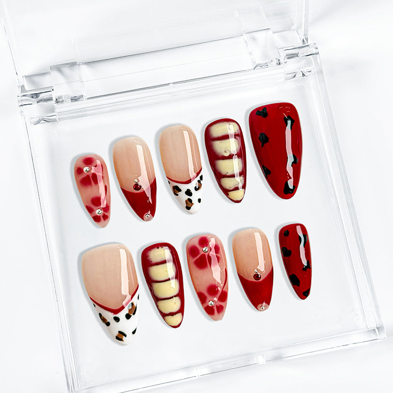 red flower nails medium almond press-on nails with nude base red tips yellow accents floral details and french tip design prom summer style