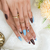 spotty nail art medium almond blue red French tip press-on nails with polka dots and star design