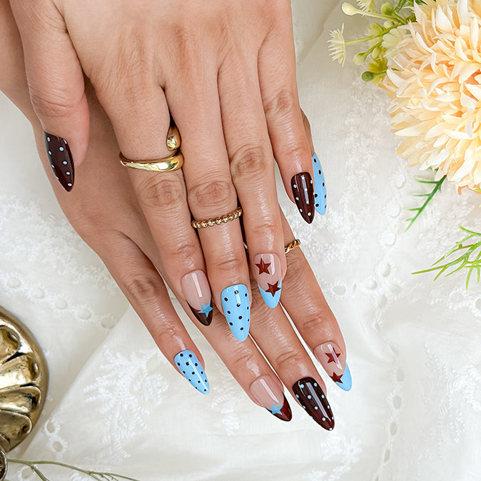 spotty nail art medium almond blue red French tip press-on nails with polka dots and star design
