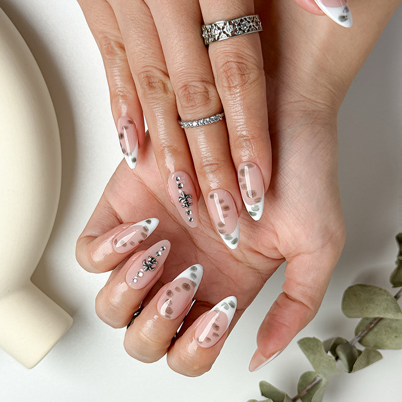 spotty nail art medium almond white French tip press-on nails for winter prom