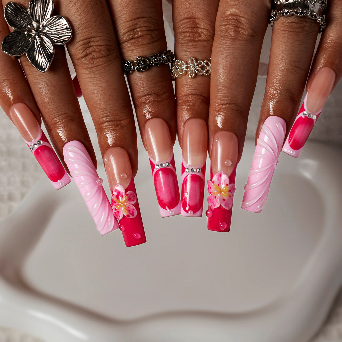 Fuchsia Ribbon Bloom SQLO0002 press-on nails hand model scene view 1