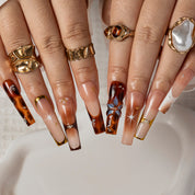Mocha Star Tortoise SQLO0003 press-on nails hand model scene view 2