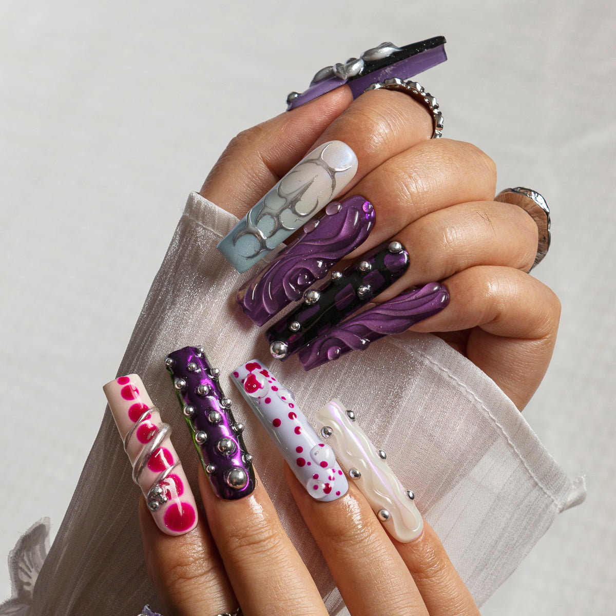 Amethyst Chrome Orbit SQLO0026 press-on nails hand model scene view 1
