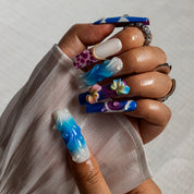 Indigo Plumeria SQLO0038 press-on nails hand model scene view 1