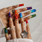 Tropical Ember Splash SQLO0045 press-on nails hand model scene view 1