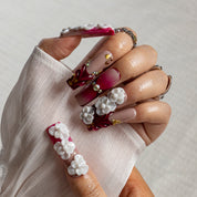 Ruby Camellia Bloom SQLO0050 press-on nails hand model scene view 1