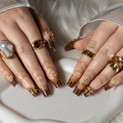 Bronze Relic Charm SQME0011 press-on nails hand model scene view 1